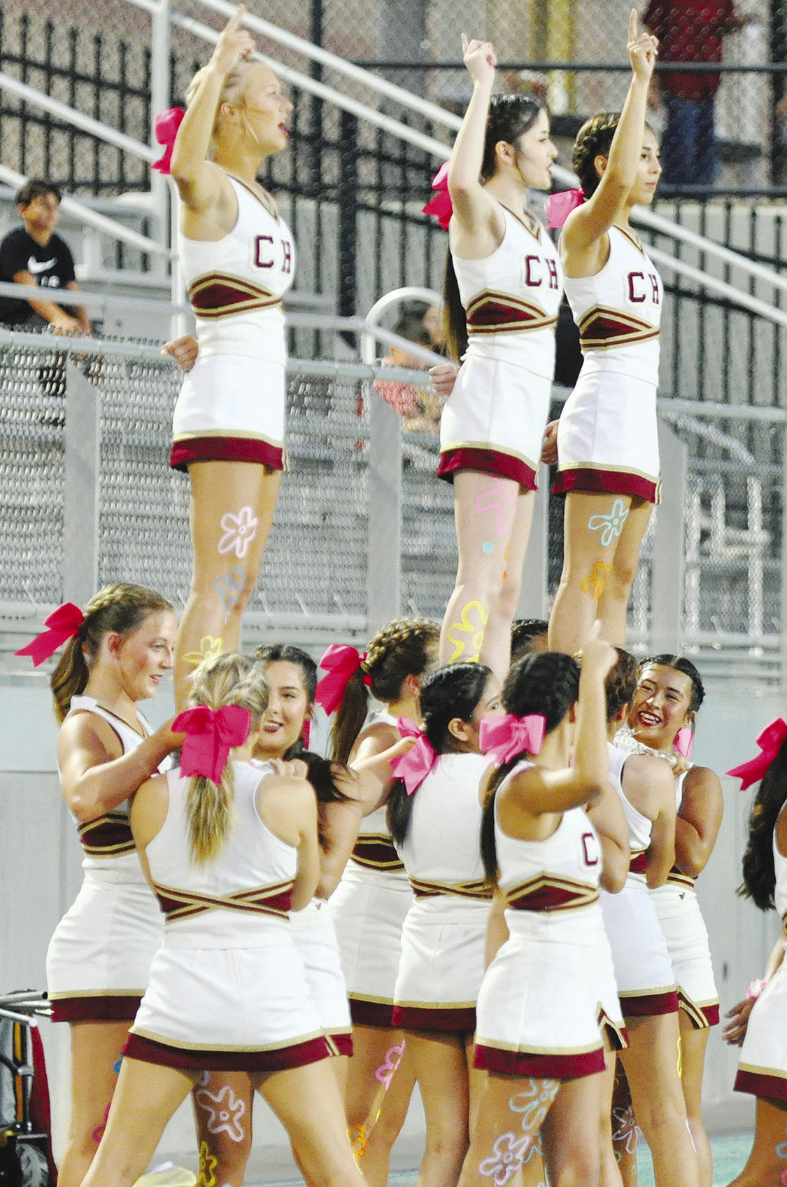 Cheering on the team Clinton Daily News