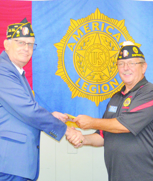 Receiving an award Clinton Daily News