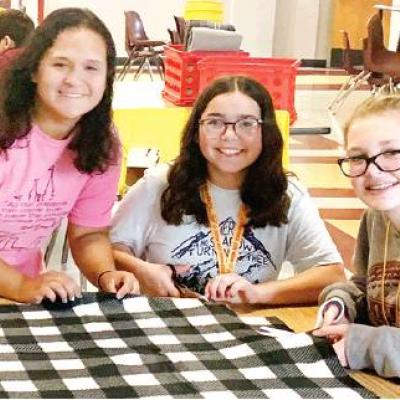 CDN | Courtesy Photo Clinton High School Key Club members give gift of warmth