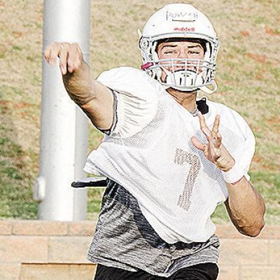 No. 7 Easten Powell throws the ball during a drill in the middle of practice Monday at the Tornado Bowl. CDN | Sam Goodwyn