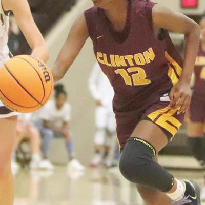Carmella Jefferson drives to the basket after stealing the ball from an Elk City player. Jefferson led the Lady Reds with 14 points in Tuesday’s win. CDN | Adam Ewing Reds tag Elks in opener