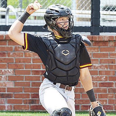 Clinton’s Vince Jones throws the ball back to his pitcher during the Reds’ road game against A-B. CDN | Sam Goodwyn Clinton’s Vince Jones throws the ball back to his pitcher during the Reds’ road game against A-B. CDN | Sam Goodwyn