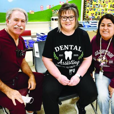 Brenda Martinez, a WTC dental assisting graduate (2007) and now second-grade teacher at Southwest Elementary School, at right, met up with her former instructor, Kelly Pease, middle, and the dentist she worked with for 15 years, Dr. Floyd Simon Jr., durin Brenda Martinez, a WTC dental assisting graduate (2007) and now second-grade teacher at Southwest Elementary School, at right, met up with her former instructor, Kelly Pease, middle, and the dentist she worked with for 15 years, Dr. Floyd Simon Jr., durin