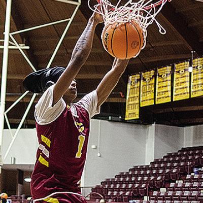 Clinton’s DJ Lister dunks the ball as he warms up for practice in the Tornado Dome. CDN | Sam Goodwyn Clinton’s DJ Lister dunks the ball as he warms up for practice in the Tornado Dome. CDN | Sam Goodwyn