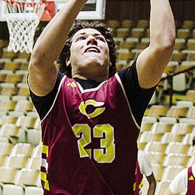 Clinton’s Easten Powell goes up for the layup during a basketball practice at the Tornado Dome. CDN | Sam Goodwyn