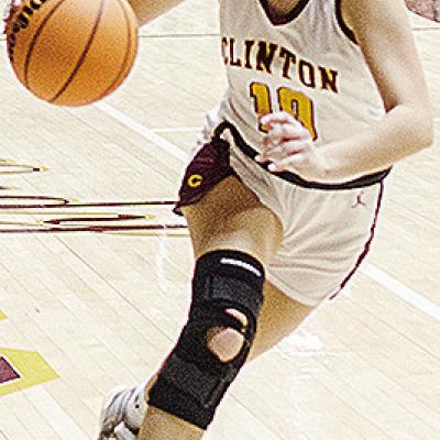 Clinton’s Hadley Meget drives the ball into the lane during the Lady Reds’ home game Saturday against Elk City. CDN | Sam Goodwyn