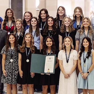 The Arapaho-Butler fast-pitch softball team was celebrated at the Oklahoma State Capitol Tuesday after winning the state championship this past fall. Pictured, from left, in front are Izzie Dewees, Kylin Oakes, Adrian Randle, Reagan Schoeppach, Madi Lockh