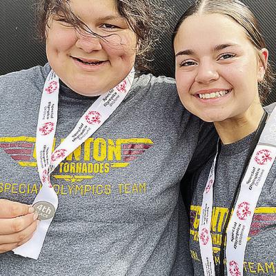 Winter Lee, left, and Tatum Shackelford smile after competing in the Unified Bocce Ball at the Special Olympics Summer State Games last week at Oklahoma State University. CDN |Courtesy Photo