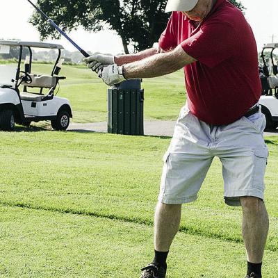 Mike Rollins begins his swing as he plays a round of golf at Riverside Golf Course. CDN | Sam Goodwyn