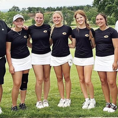 The Clinton Lady Reds golf team comes together following its performance in the recent Class 4A State Tournament at Dornick Hills Country Club. Pictured, from left, are Coach Brent Caldwell, Emma Ray, Paige Pugh, Jocelyn King, Bella Bridgeman, Tatum Fansh