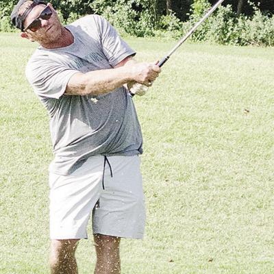 Wade Cummins watches the ball fly after driving it far during a round of golf at Riverside. CDN | Sam Goodwyn