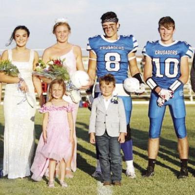 The king and queen were crowned at the Corn Bible Crusader Homecoming Friday. The homecoming court was from left, Miriam Thiessen, Lizzie Kauk, Emalia Lind, Homecoming Queen Elle Bittle, Homecoming King Lane Russell, Savvye Fuller, Lance Hulett and Grant CBA Homecoming court