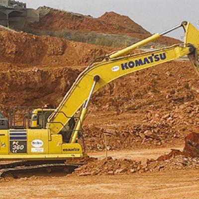 An excavator clears dirt Monday in front of Holiday Inn Express as part of the Exit 65 project. CDN | Christian Jacobsen