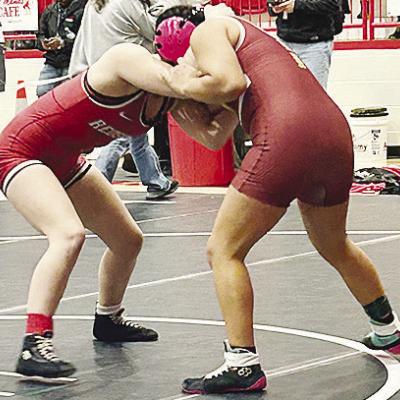 Clinton’s Angelina Ramirez, right, grapples with her opponent during the Class 5A girls’ wrestling tournament Monday in Cache. CDN | Courtesy Photo