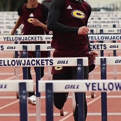 Parker Adams performs in the 110-meter hurdles for Clinton during the Kingfisher track meet Tuesday. CDN | Courtesy photo CHS track finds success at Kingfisher track meet