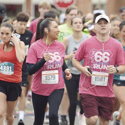 Runners take off at the start of the second annual Clinton Classic. CDN | Sam Goodwyn Dowtown race sees increase in numbers