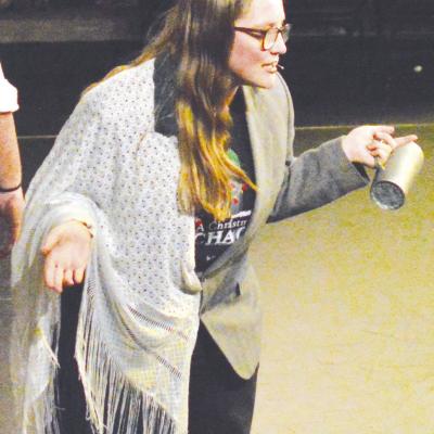 Amy Baker pulls double duty while playing both Mr. and Mrs. Cratchit during the Southwest Playhouse’s production of “A Christmas Chaos.” CDN | Micah Ashcraft