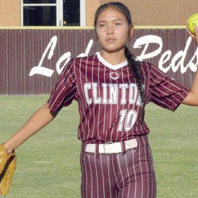 Kamarie Yelloweagle throws the ball to the infield during a recent softball game. CDN | Josh Jennings Yelloweagle is joyful to be back home