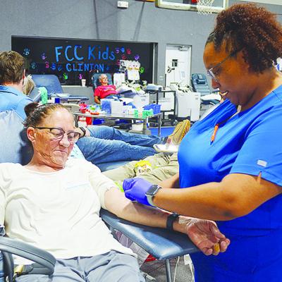 Sherry Ernst, left, is prepped to donate blood by Whitney Gilder Tuesday afternoon at the blood drive held at the First Christian Church’s Family Life Center. CDN | Micah Ashcraft Sherry Ernst, left, is prepped to donate blood by Whitney Gilder Tuesday afternoon at the blood drive held at the First Christian Church’s Family Life Center. CDN | Micah Ashcraft