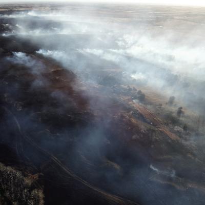 A drone image shows the extent of smoldering damage wrought to the countryside from the fire near the 75 mile marker on Interstate 40. CDN | Courtesy photo