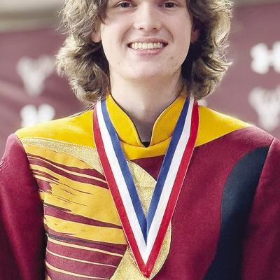 Clinton High School senior Jackson McCullough stands during High School Shortgrass Honor Band, where he was recognized as a 3-year high school medalist, held at the Pioneer Performing Arts Center in Elk City. CDN | Courtesy photo