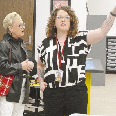 Donna Rother, left, looks in awe as art teacher Megan Malloy shows off her brand new art room during the new Clinton Middle School open house Monday evening. Classes at the new facility began Tuesday. CDN | Micah Ashcraft