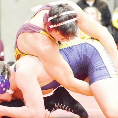 Clinton class of 2020 grad Jaime Mitchell battles against a wrestler from Heritage Hall in the 2019-2020, Class 4A West Regional Tournament. CDN | Collin Wieder Mitchell wrestles some, preserves redshirt