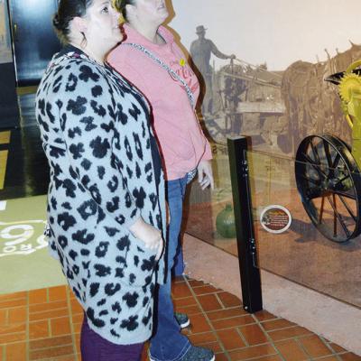 Sisters Mellissa Stout, left, and Elizabeth Stout from Florida visited Clinton to view the Oklahoma Route 66 Museum. CDN | Michael Maresh