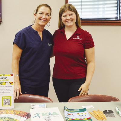 Clinton Regional Hospital Dietician DeAnne Foster, left, and DUO for Health Coordinator Madison Hemenway share a table recently at the Clinton Regional Hospital Health and Wellness event to help promote healthier diets to the community. CDN | Micah Ashcra