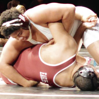 Malachi Lorne rolls his Weatherford opponent to his back in the 215-pound match. CDN | Staff photo CHS grapplers edge Eagles