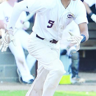 Taking care of buisness on both sides of the diamond