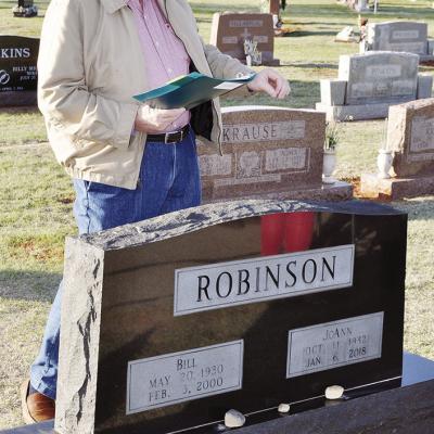 Presenter Rod Serfoss shares stories of growing up in the same neighborhood of Bill and Jo Ann Robinson during the recent Clinton Cemetery Tour. CDN | Staff Photo