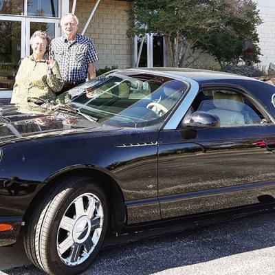 Square-dancing couple leaves Ardmore in a new T-Bird