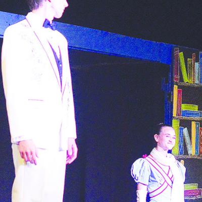 Braxton Driskill, left, and Jovi Petzold play the respective roles of The Escapologist and The Acrobat during the production of “Matilda,” hosted at Southwest Playhouse. CDN | Micah Ashcraft