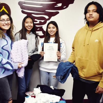 Students collecting clothing for shelter