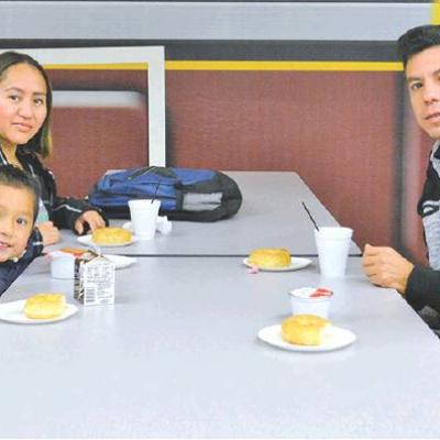 Families enjoy ‘donuts with dudes’