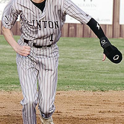 No. 1 Jeter King speeds toward third during Clinton’s win over Western Heights Tuesday at home. CDN | Sam Goodwyn