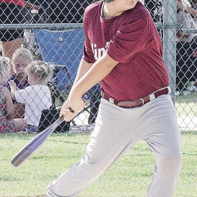 Santiago Vazquez keeps his eye on the ball during Clinton’s baseball game in the OK Kids 8U Baseball State Tournament at Schumacher Fields at Acme Brick Park. CDN |Sam Goodwyn