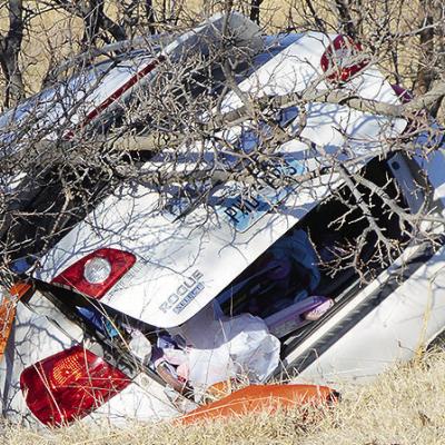 This Nissan Rogue is being prepared to have its doors pried open to remove the driver and provide medical treatment after an accident Tuesday morning on Walton Road off of U.S. Highway 183, south of Clinton. Only the one vehicle is known to be involved in