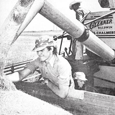 50 YEARS AGO Deck Travis looks at the wheat being augered into the truck by his grandfather, Andrew Buffing. Walking behind Travis is Terry Igo, son of the wheat owner Glen Igo. Western Oklahoma’s wheat harvest was back in swing after rain showers had d CLINTON’S HISTORY 10, 20, 30 AND 50 YEARS AGO