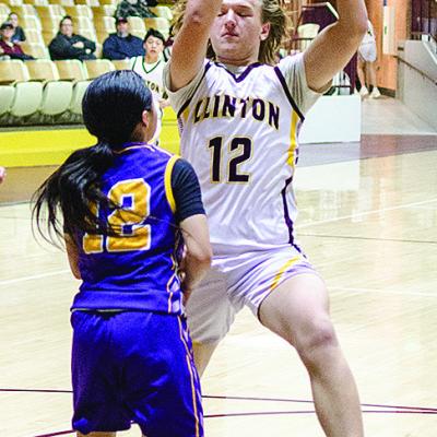 Eighth-grader Liam Lofland eurosteps around an Anadarko defender during the Whirlwinds’ game against the Warriors in the Tornado Dome. CDN |Sam Goodwyn