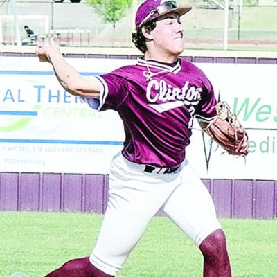 Clinton’s Easten Powell hurls the ball to first for the out during the Reds’ home game Tuesday against Weatherford. CDN | Sam Goodwyn