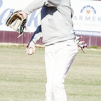 Jeter King throws the ball back to the mound after fielding it during Thursday’s practice. CDN | Sam Goodwyn