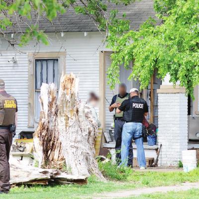 Federal, state, local law enforcement converge on two Clinton homes