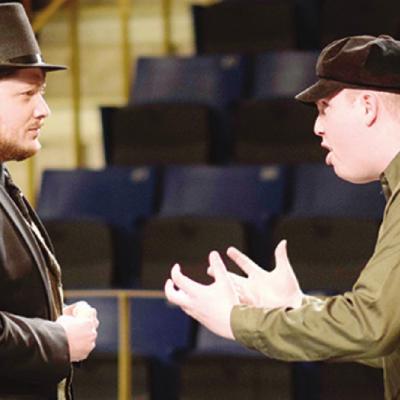 Brandt Arganbright, left playing Mr. Charles Webb, and Zach Perry, who plays various roles, run through one of the scenes in Southwest Playhouse’s “Our Town.” Shows are set for April 23-25, 30 and May 1-2. ‘Our Town’ opens Friday at Southwest Playhouse