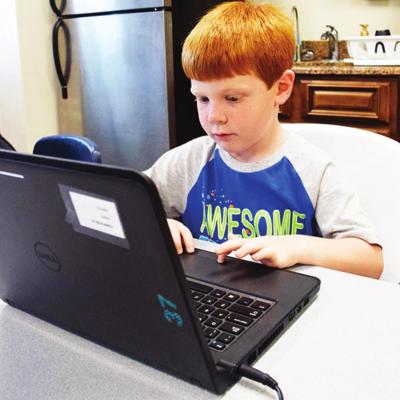 CDN | Litzy Silos Browsing the laptop