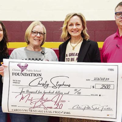 The Clinton Public School Foundation recently presented grants. From left, are Southwest Elementary Principal April Miner, Librarian Christy Stephens and Foundation board members Jenn Mosburg and Tim Miller.