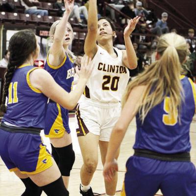 No. 20 Paige Lloyd takes the shot amid three defenders during a tournament contest last season. CDN | Emily Stephens Lady Reds to open season Friday at home