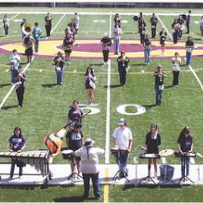 The “Pride of Clinton” practices its “Shades of Latin” marching show at the Tornado Bowl. CDN | Caleb Blanchard ‘Pride of Clinton’ ready to display ‘Shades of Latin’