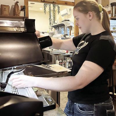CHS alumna Chloe Bailey whips up an espresso for a customer while working a shift at Strayhouse Kitchen + Coffee. CDN | Micah Ashcraft CHS alumna Chloe Bailey whips up an espresso for a customer while working a shift at Strayhouse Kitchen + Coffee. CDN | Micah Ashcraft